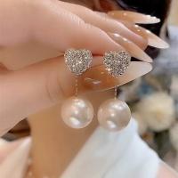 Золотые серьги из жемчуга